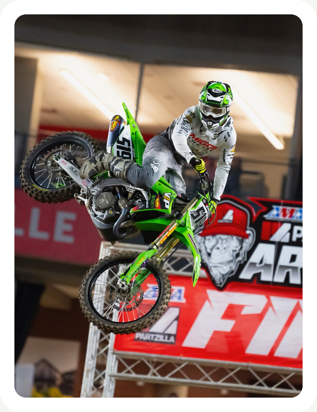 Josh Cartwright riding his Kawasaki over an Arenacross jump