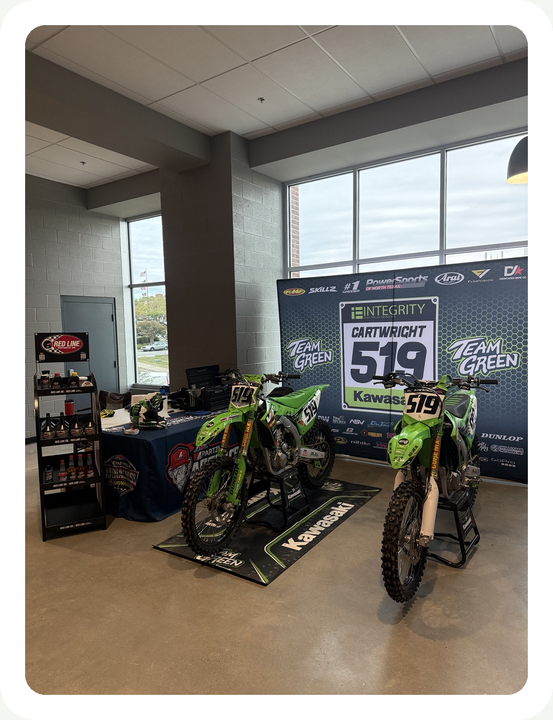 Kawasaki racing motorcycles in the team pit area